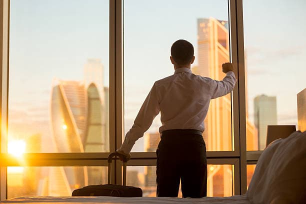 Man looking out of a window